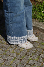 Calça jeans wide leg renda